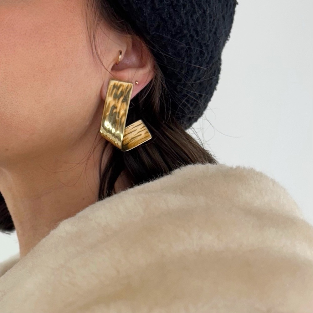 Vintage gold brass clip on statement earrings with a wavy hammered texture 80s